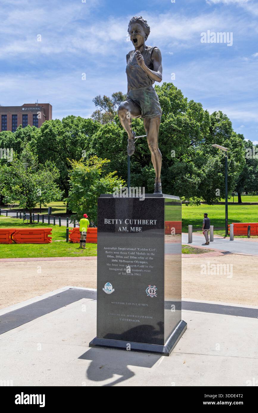 fig 8: Betty Cuthbert wearing her three Olympic gold medals.